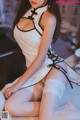 Coser @ 过期 米线 线 喵: 旗袍 白色 (22 photos) P14 No.7dc321